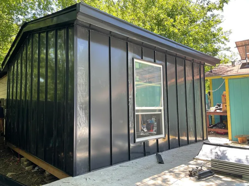 Black standing seam metal wall panels for Roof Inspection in Laurel Bay
